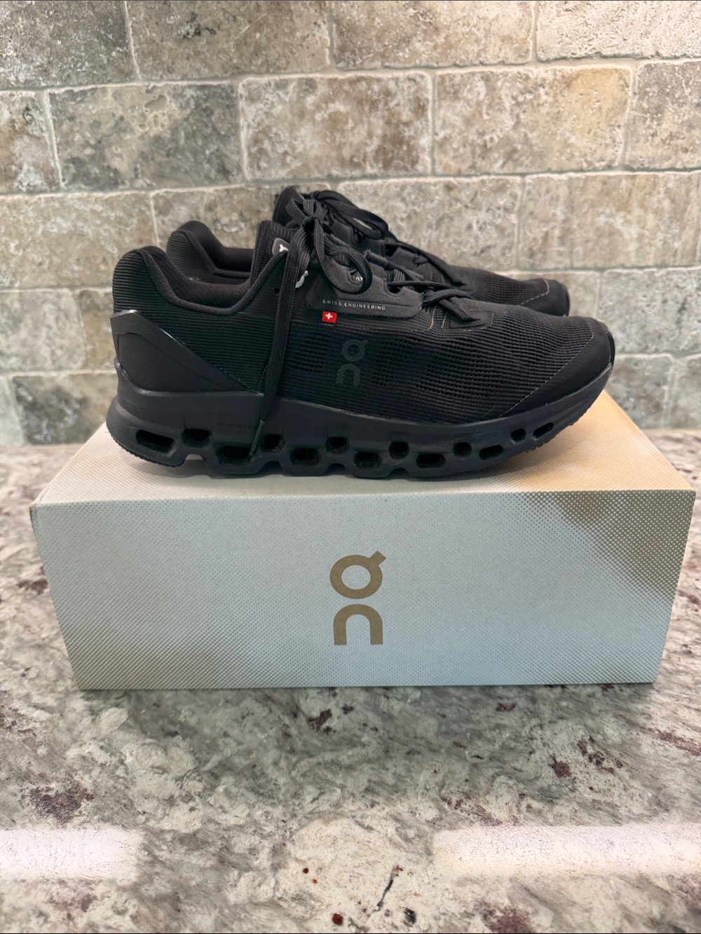 On Running women’s Cloudstratus Black Athletic Shoes